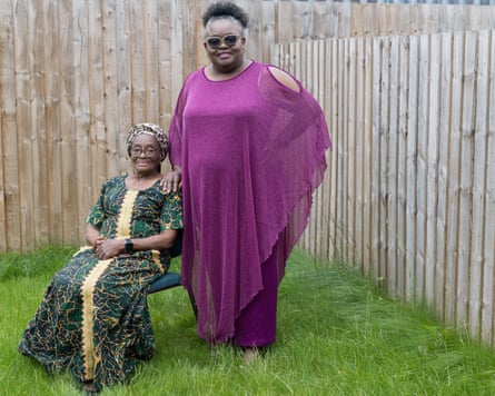 Comfort Olufunmilayo Olawo and her daughter June in their garden