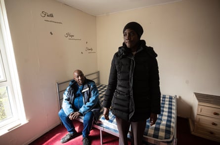Andrea Gilbert and another Thamesmead resident in a bedroom in the 1960s block