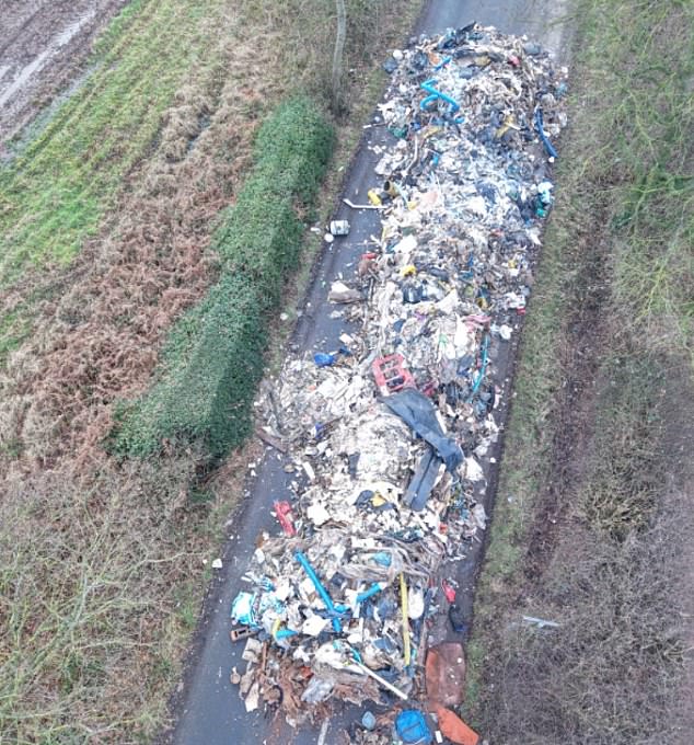 The eight-foot-high mound of rotting waste took 38 hours to clear up