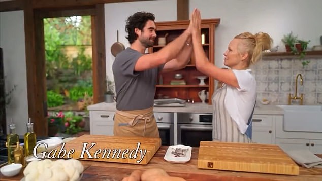 Anderson pictured high-fiving one of her celebrity guests on her programme