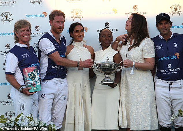 Dr Chandauka, pictured with the Sussexes at the Royal Salute Polo Challenge last April, alleged she was asked to defend Meghan after she was publicly crucified