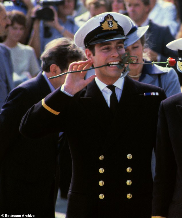 Prince Andrew holds a rose in his mouth upon his return from the Falklands. Andrew was the royals' golden prince coming home from Britain's victory in the Falklands war