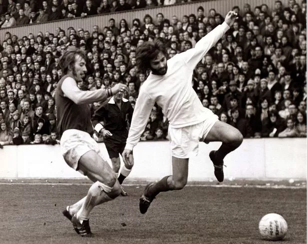 Billy Bonds tackles George Best