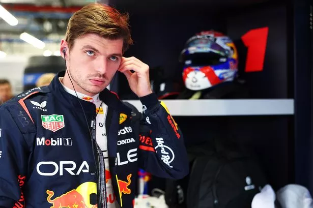 LUSAIL CITY, QATAR - NOVEMBER 29: Max Verstappen of the Netherlands and Oracle Red Bull Racing prepares to drive in the garage prior to the Sprint ahead of the F1 Grand Prix of Qatar at Lusail International Circuit on November 29, 2025 in Lusail City, Qatar. (Photo by Mark Thompson/Getty Images)