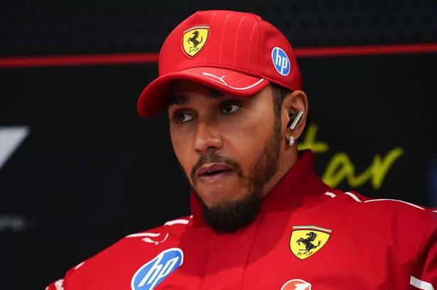 Lewis Hamilton in front of a TV camera. 