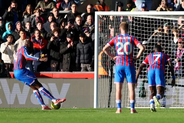 Jean-Philippe Mateta of Crystal Palace scores a penalty which was later retaken due to a double touch during the Premier League match between Crystal Palace and Manchester United
