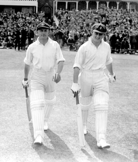 Don Bradman and Stan McCabe make their way to the wicket