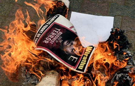 Protesters in New Delhi burn images of Ashin Wirathu, a hardline Buddhist monk in Myanmar, June 2015.