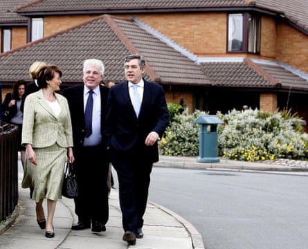 The then chancellor Gordon Brown (right) visits the Eldonian village with MP Louise Ellman and trust representative Tony McGann.