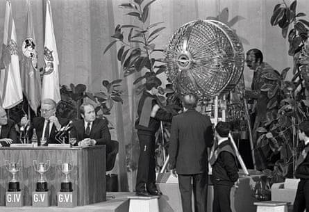 Hermann Neuberger throws up his arms in disgust while Sepp Blatter glares at the machine after problems arise with the mechanical drum containing the balls during the 1982 World Cup draw ceremony at the Palacio De Exposiciones Y Congresos in Madrid
