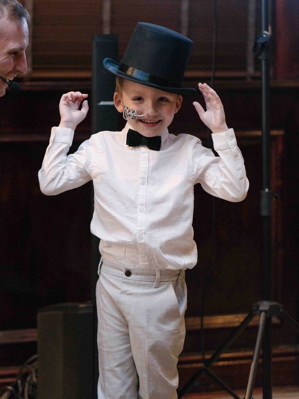 Magic Man, little Charlie wows at being a magician