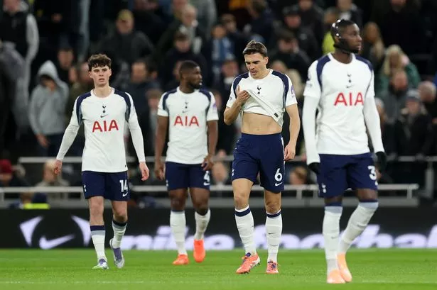 Joao Palhinha and his Tottenham Hotspur players look dejected after conceding against Fulham