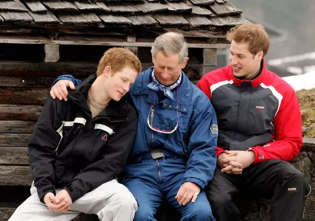 HRH Prince Charles poses with his sons Prince William (R) and Prince Harry (L) during the Royal Family's ski break at Klosters on March 31, 2005 in Switzerland