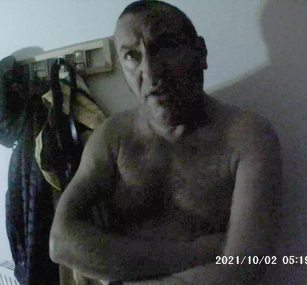 David Carrick shirtless during his arrest in 2021