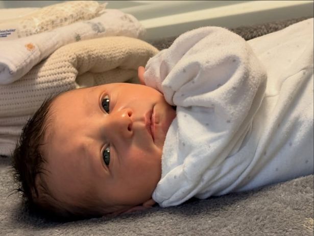 Alex Bourne's baby son