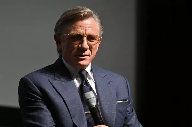 Daniel craig in dark suit