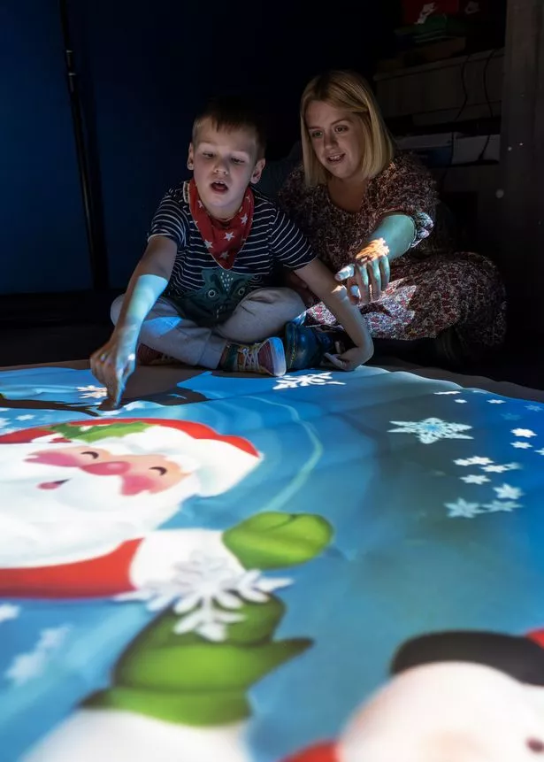 Seb with mum Hannah on the Lifelites magic carpet