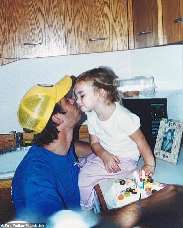 One precious picture showed the dad-daughter duo leaning in for a kiss