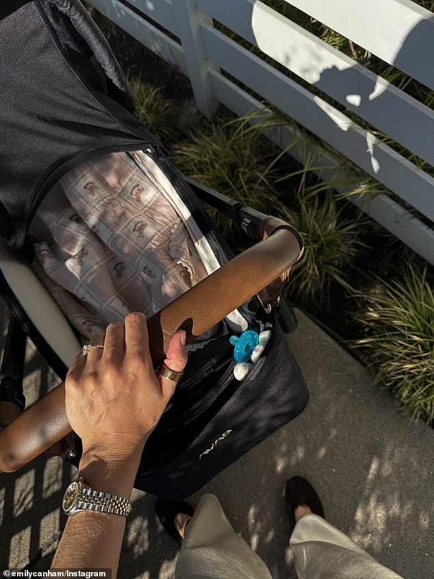 Dressed in a pair of black leggings and a long-sleeved top with a bouncy blow dry, the influencer stood next to a pram to update her fans on the news