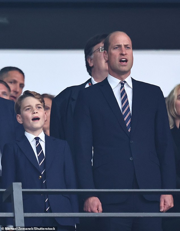 William with son Prince George at the football