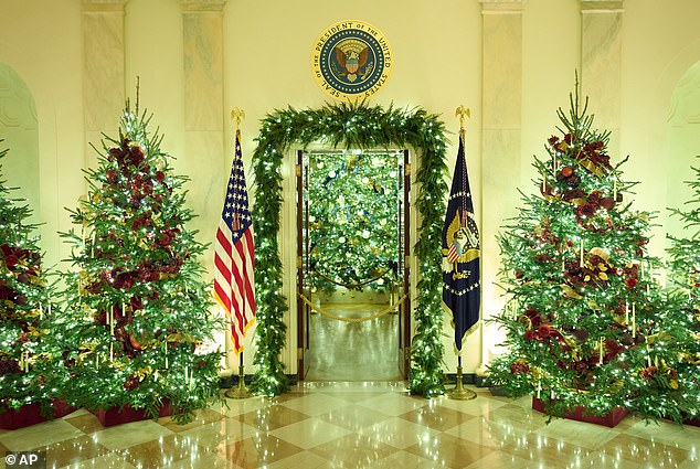 The decorations featured 75 wreaths and 51 Christmas trees scattered throughout the White House
