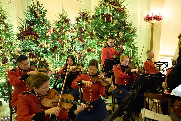 The President's Marine Band played Christmas tunes, including the entire soundtrack to The Nutcracker, as visitors toured the holiday decor