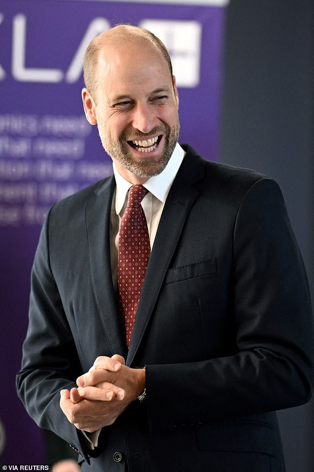Prince William is pictured while talking to employees during a visit at the semiconductor manufacturer SPTS, a division of KLA, on Monday