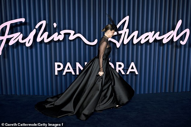 In a bid to showcase her evolution from TOWIE star to fashion mogul, Sam Faiers arrived in a dramatic black gown with a fishtail skirt