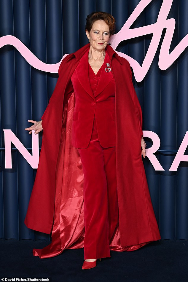 Proving she could still steal the show even after her stint on Celebrity Traitors, Celia Imrie arrived in an eye-catching red velvet trouser suit with a matching coat