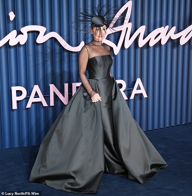 Sam turned heads in a dramatic look as she graced the Royal Albert Hall's red carpet