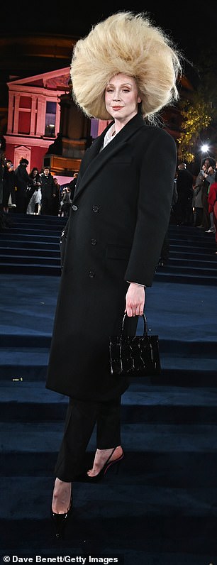 Gwendoline, 47, wore a huge, kooky wig