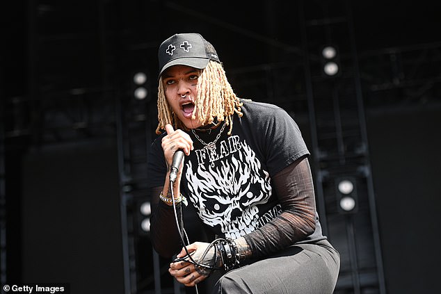The young rapper-singer had built a devoted following and worked closely with Blink-182 drummer Travis Barker on several tracks (seen in 2022)