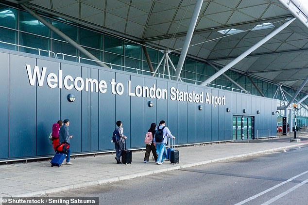 A former England and Premier League footballer has been arrested at Stansted Airport (pictured) on suspicion of attempted rape