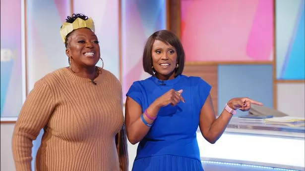 Judi love and kelle bryan in xmas hats on lw