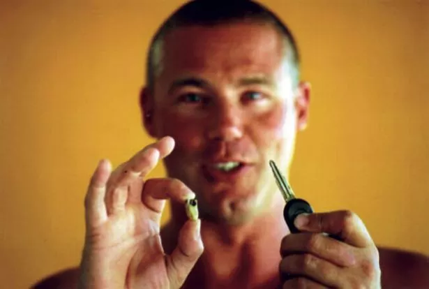 Ricky Megee holding teeth and car keys