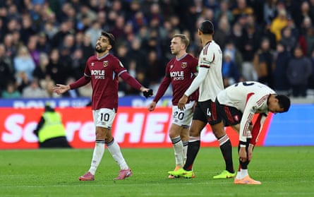 West Ham’s Lucas Paquetá shows his displeasure after being sent off against Liverpool.