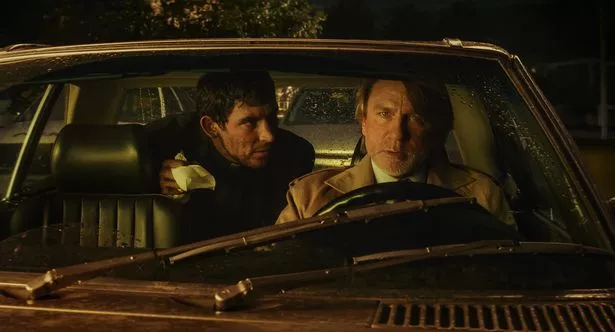 Josh o'connor and daniel craig in car in wake up dead man scene