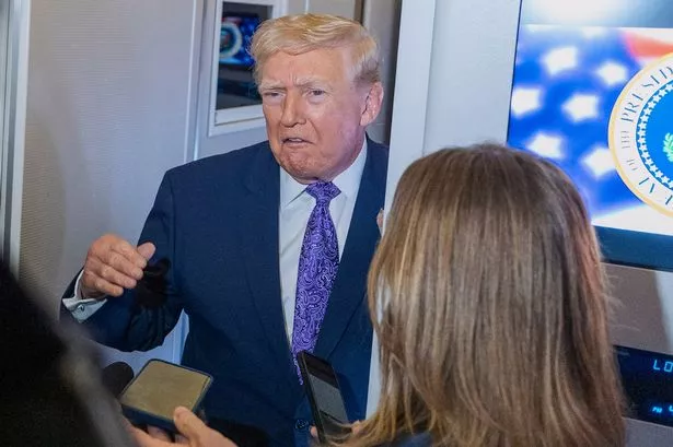 The US President speaks with reporters while in flight as he travelled from Palm Beach, Florida, to Maryland's Joint Base Andrews